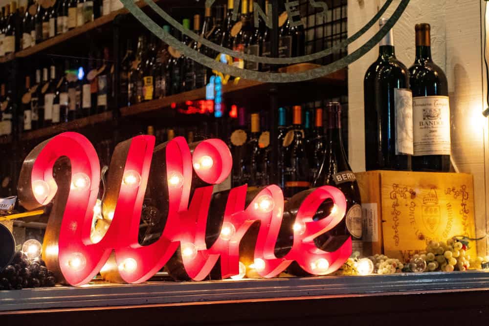 Photo of a marquee sign that reads "Wine"